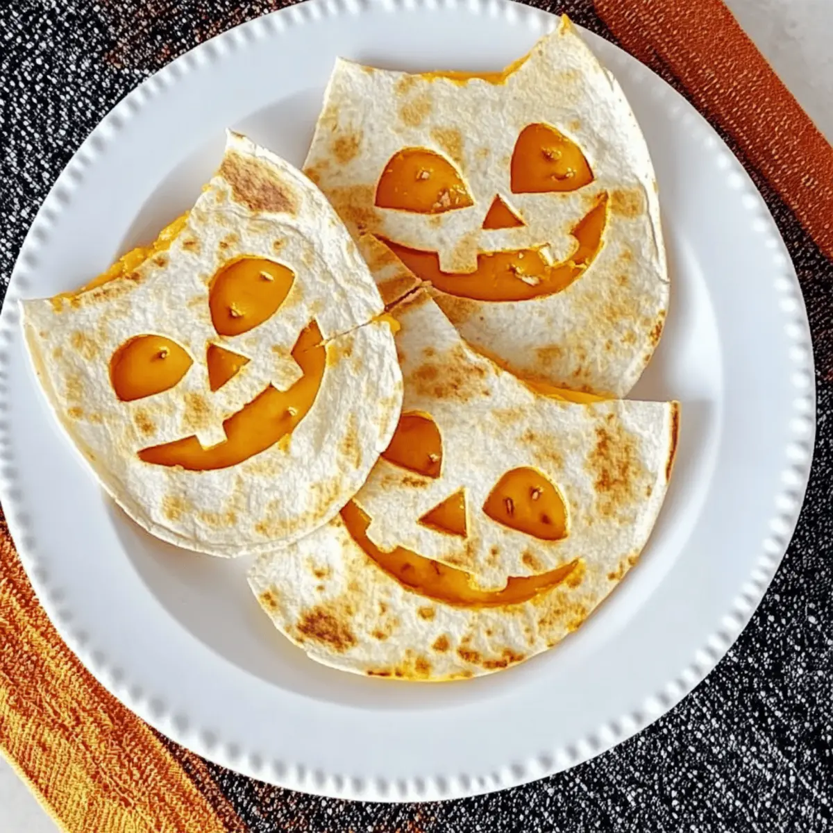 Pumpkin-Packed Jack o Lantern Quesadillas for Halloween Fun