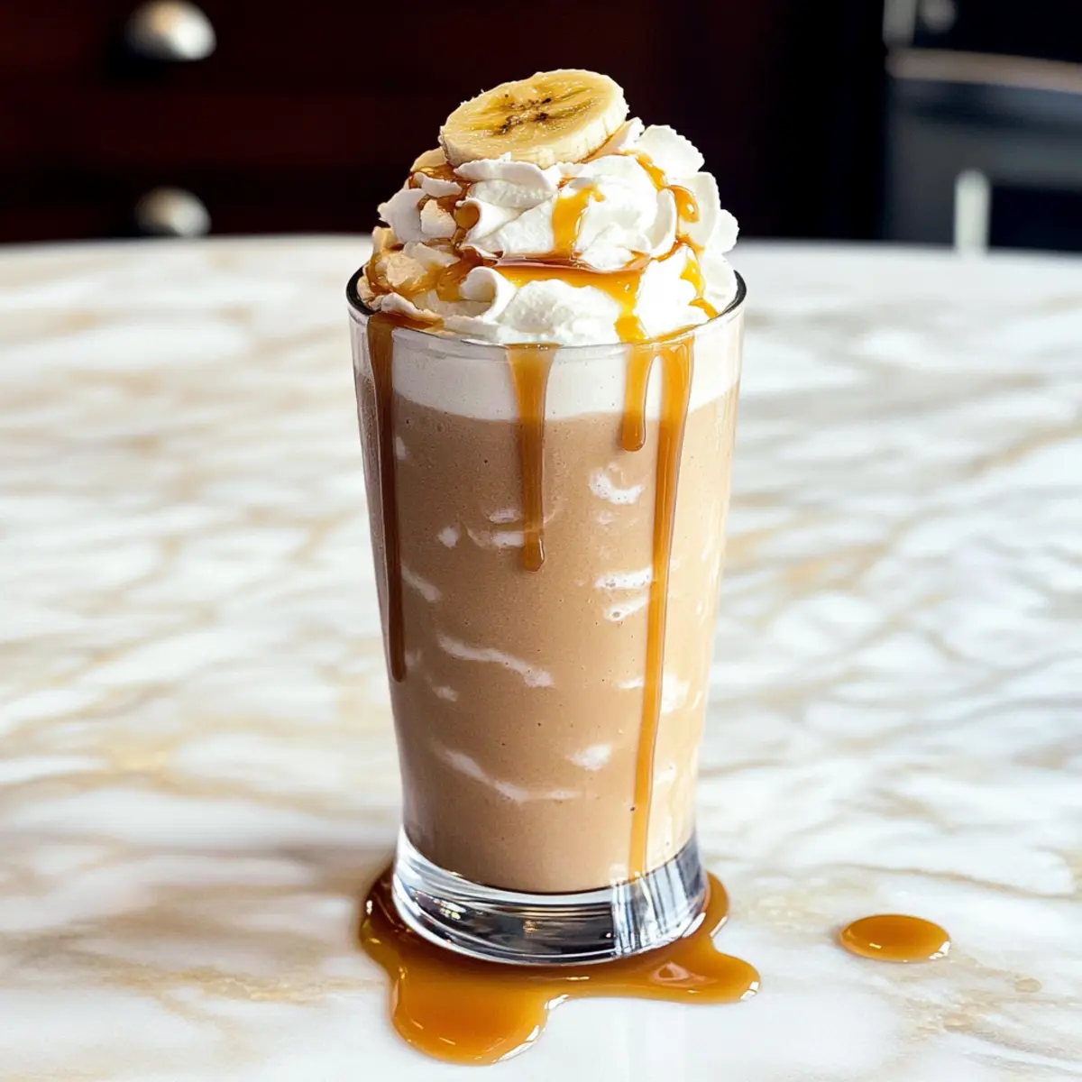 Indulge in a Creamy Banana Caramel Frappé Bliss